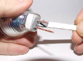 Glue the LED unit into the halogen bulb case